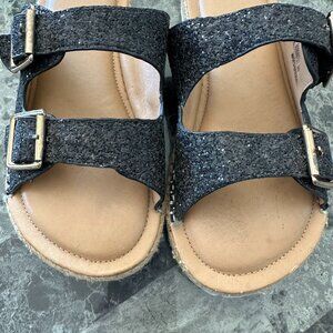 Women's sparkly slip on sandals with gold tone side buckles